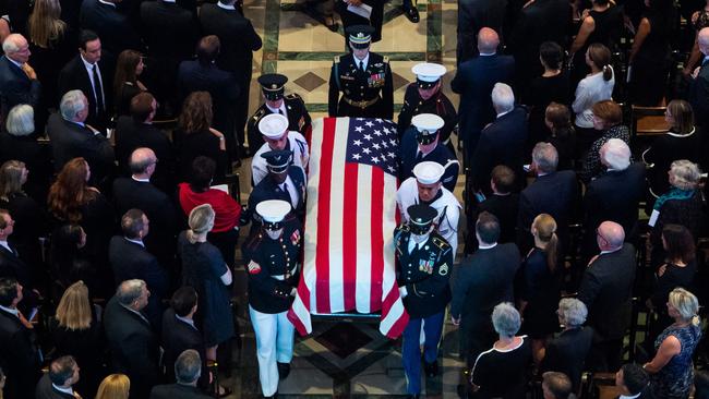 The scene at Mr McCain’s memorial service as his casket was carried out. Picture: Saul Loeb/AFP