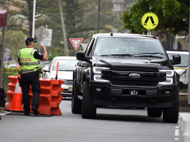 Police check cars at the Queensland border with NSW. Picture: Steve Holland