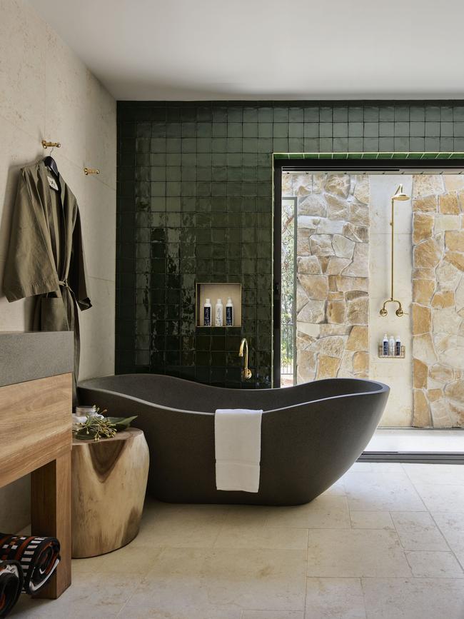 Green tiles feature in the Bouddi Lodge bathroom. Picture: Anson Smart