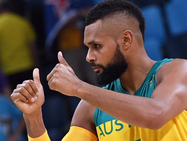 Australia's guard Patty Mills reacts after defeating Lithuania during a Men's quarterfinal basketball match between Australia and Lithuania at the Carioca Arena 1 in Rio de Janeiro on August 17, 2016 during the Rio 2016 Olympic Games. / AFP PHOTO / Mark RALSTON