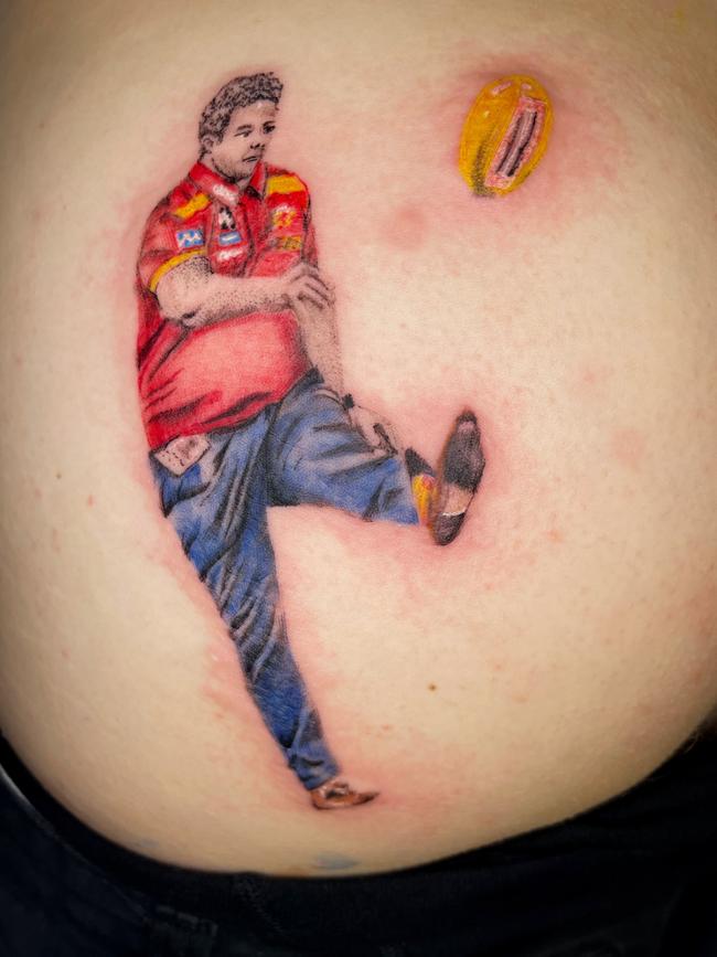 Former Carlton and Gold Coast Suns player Daniel Gorringe has had a large tattoo of Gold Coast Suns coach Stuart Dew inked onto his backside after loosing a bet. Picture: Supplied