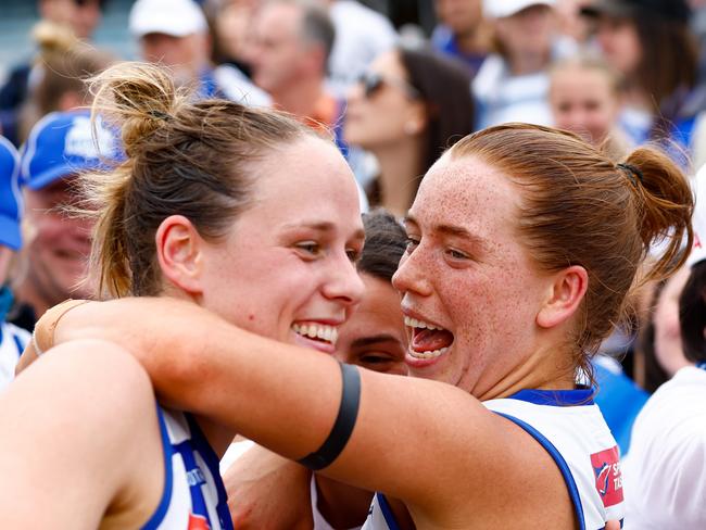 Mia King (right) celebrates with teammate Kim Rennie after the preliminary final win over Adelaide. (Photo by Dylan Burns/AFL Photos via Getty Images)