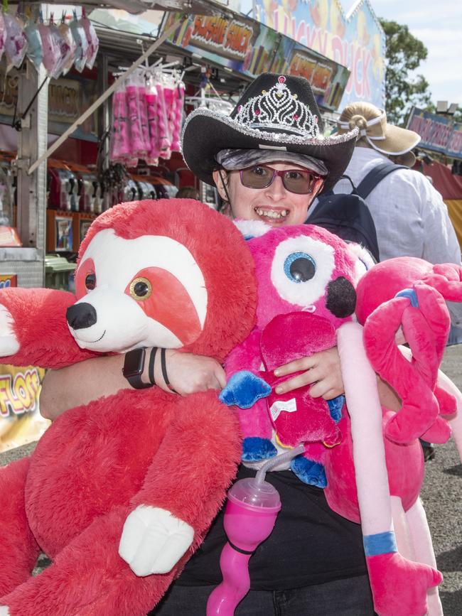 Brianna Jensen with a great haul of stuffed toys. Toowoomba Royal Show. Friday, March 31, 2023. Picture: Nev Madsen.