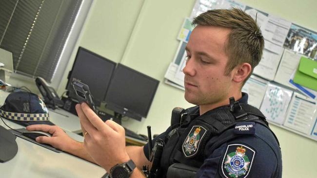 Constable James Harris puts his SMS skills to the test. Picture: Nathan Greaves