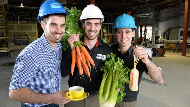 Greengrocer Tony &amp; Marks have operated a store at the Brickworks Market site since its 2015 redevelopment. Pictured are Capobianco brothers Michael, Frank and Paul. Picture: Campbell Brodie