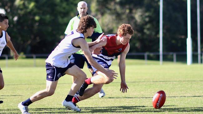 St Andrew's and Mountain Creek players chase the ball at Maroochydore on Wednesday during their grand final clash. Picture: St Andrew's Anglican College Facebook