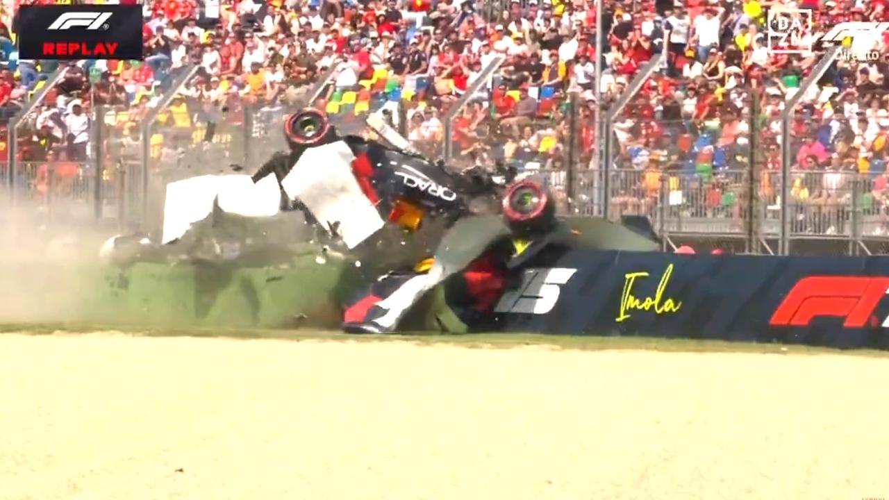 F1 star in horror scene as car flips into cage