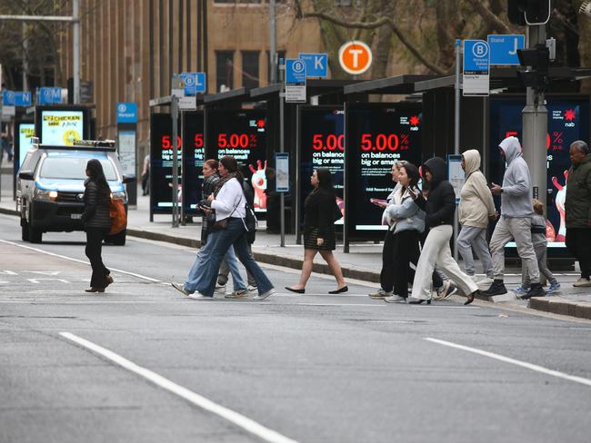 People crossing York Street at Wynyard Station alongside the bus stops in the Sydney CBD near Wynyard Station. Picture: Newswire /Gaye Gerard