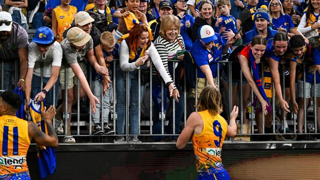 PERTH, AUSTRALIA - MAY 19: Harley Reid of the Eagles celebrates the win with the fans during the 2024 AFL Round 10 match between Waalitj Marawar (West Coast Eagles) and Narrm (Melbourne Demons) at Optus Stadium on May 19, 2024 in Perth, Australia. (Photo by Daniel Carson/AFL Photos via Getty Images)