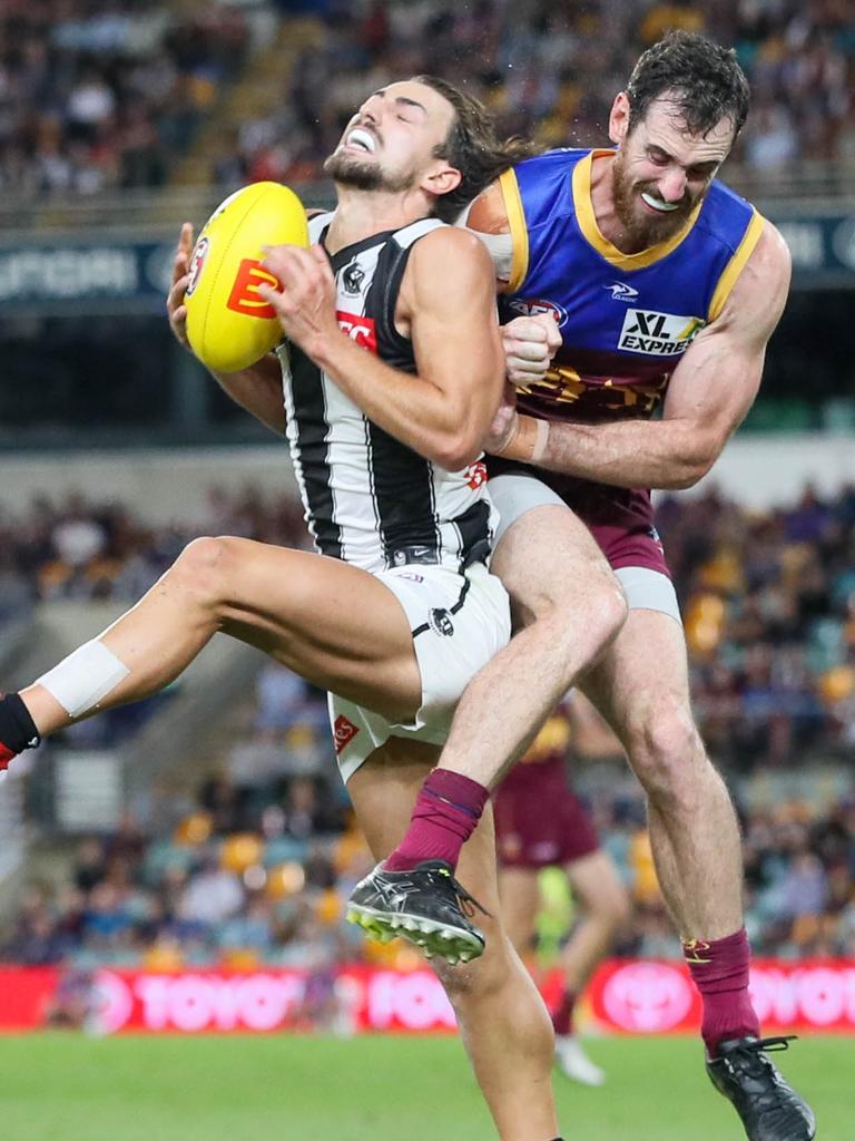 Darcy Gardiner slams into Nick Daicos after he marks. Picture: AFL Photos via Getty Images