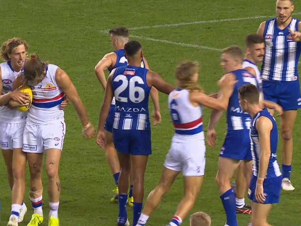 Smith shoves Jack Ziebell after the North skipper is outmarked by Josh Bruce.