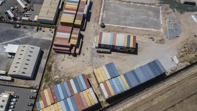 Some of the shipping containers containing recycling which are stockpiled at Wingfield. Picture: Simon Cross