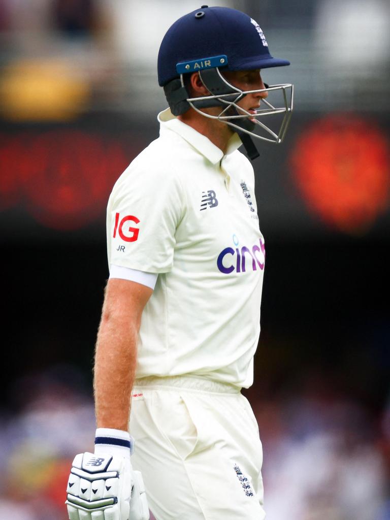 England's Joe Root departs after being dismissed for a duck. Photo by Patrick HAMILTON / AFP.