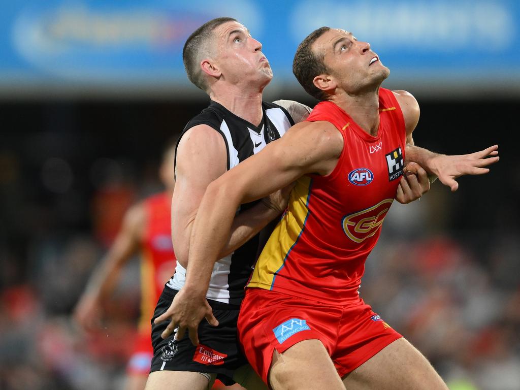 GOLD COAST, AUSTRALIA – JUNE 29: Jarrod Witts of the Suns competes for the ball against Darcy Cameron of the Magpies during the round 16 AFL match between Gold Coast Suns and Collingwood Magpies at People First Stadium, on June 29, 2024, in Gold Coast, Australia. (Photo by Matt Roberts/AFL Photos/via Getty Images)