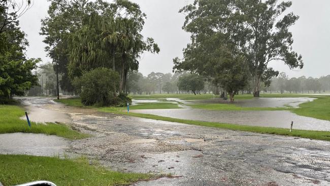 Urunga Foreshore Drive and golf course underwater on Tuesday afternoon. Picture: Chris Knight