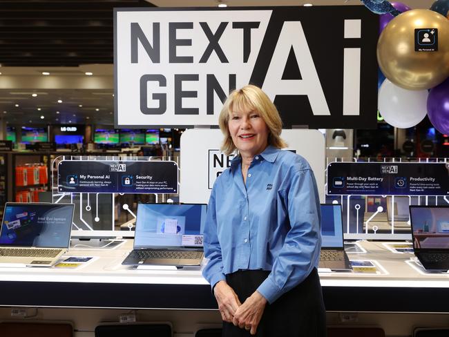 Harvey Norman CEO Katie Page with a Microsoft Copilot+ (AI) laptop. Picture: John Feder/The Australian.