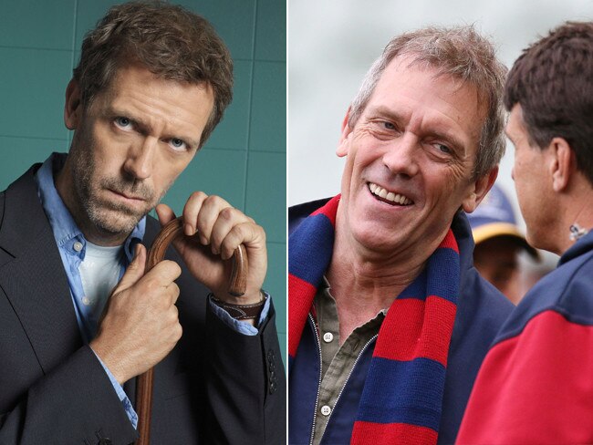 Actor Hugh Laurie was presented with a Melbourne Demons jumper but cleverly didn’t put it on for the cameras. House knows everything.