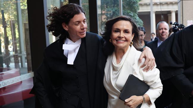 Sue Chrysanthou SC hugs Lisa Wilkinson as they emerge from court. Picture: Don Arnold/Getty Images