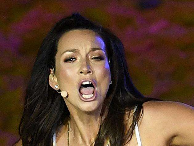 Australian singer Ricki-Lee Coulter performs during the Opening Ceremony of the XXI Commonwealth Games at Carrara Stadium, on the Gold Coast, Wednesday, April 4, 2018. (AAP Image/Tracey Nearmy) NO ARCHIVING, EDITORIAL USE ONLY