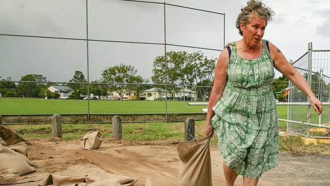 Lismore resident Susan Daysa fills sandbags in preparation for heavy rain ahead of the Cat 2 TC Cyclone Alfred's arrival this week. Picture: NewsWire / Glenn Campbell