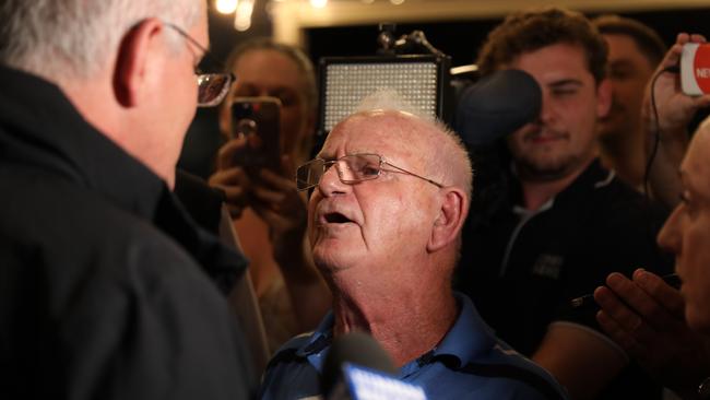 Prime minister Scott Morrison talks to a pensioner at the Edgeworth Tavern in Edgeworth, Newcastle. Picture: Damian Shaw