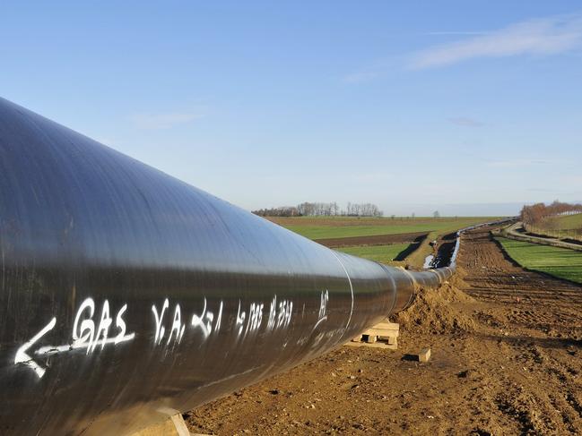 Generic picture of a gas pipeline being constructed in a hilly landscape.