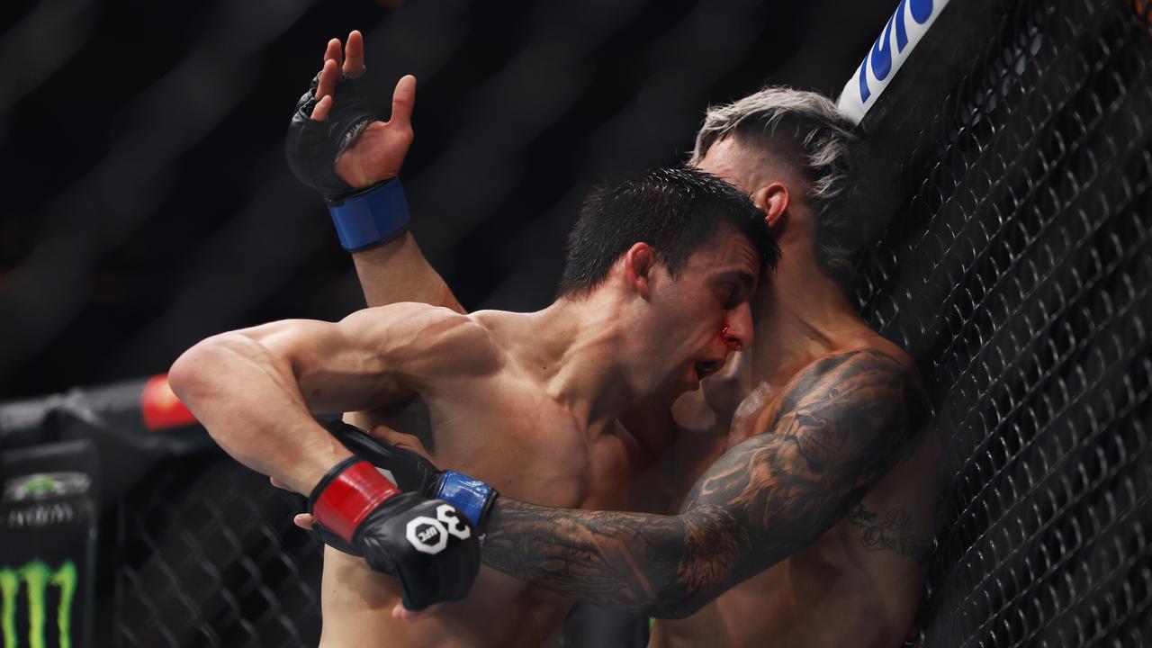 Steve Erceg punches Alessandro Costa in a flyweight fight. (Photo by Sarah Stier/Getty Images)