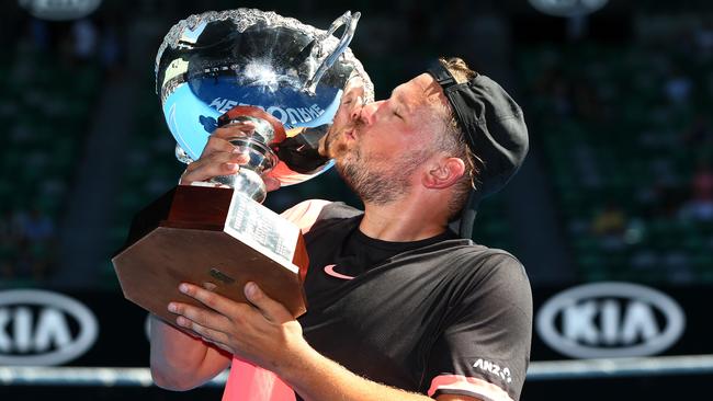 Dylan Alcott poses with the championship trophy after winning the Quad Wheelchair Singles Final during the Australian Open 2018 Wheelchair Championships. Picture: Getty