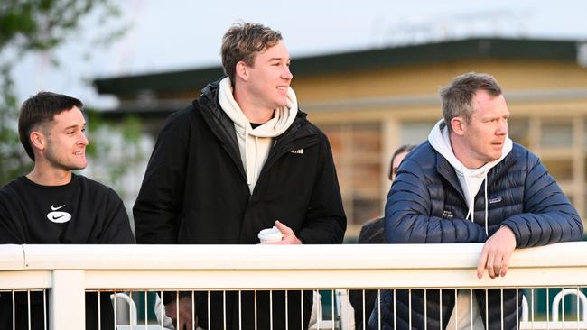 Richmond premiership stars and Soulcombe part-owners Jayden Short, Tom Lynch and Jack Riewoldt at Caulfield on Tuesday morning. Picture: Vince Caligiuri/Getty Images