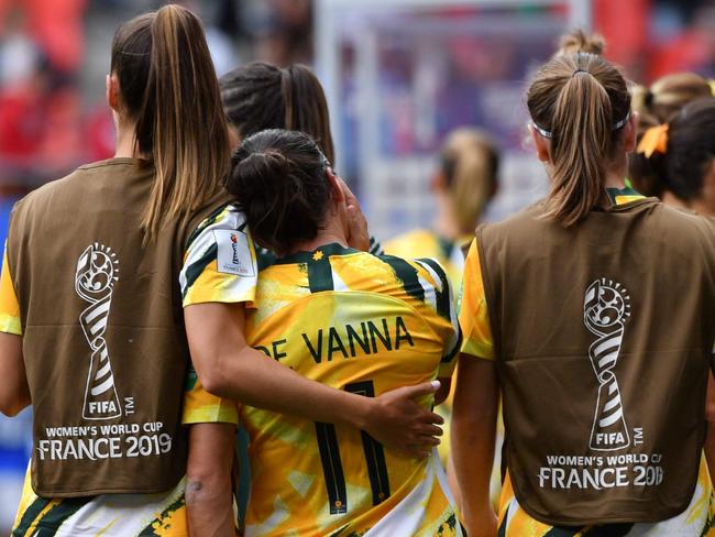 Australian players react at the end of the France 2019 Women's World Cup Group C football match between Australia and Italy, on June 9, 2019, at the Hainaut Stadium in Valenciennes, northern France. (Photo by Philippe HUGUEN / AFP)