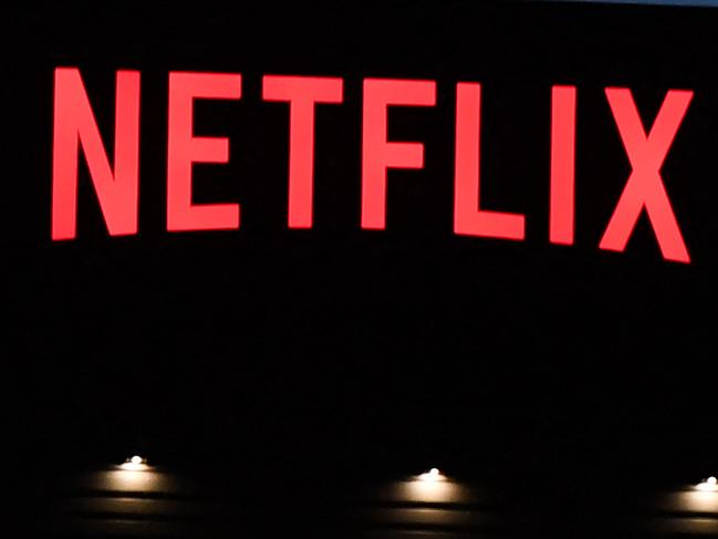 (FILES) The Netflix logo is seen on the Netflix, Inc. building on Sunset Boulevard in Los Angeles, California on October 19, 2021. Netflix on July 19, 2023 said subscriptions to the streaming television service climbed to more than 238 million in the wake of its crackdown on password sharing. Netflix finished the recently ended quarter with an addition 5.9 million subscribers and a profit of $1.5 billion, according to an earnings release. (Photo by Robyn Beck / AFP)