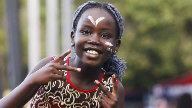 Abuk Garang, 8, enjoys the Cairns African Festival, held at Fogarty Park on Saturday. Picture: Brendan Radke