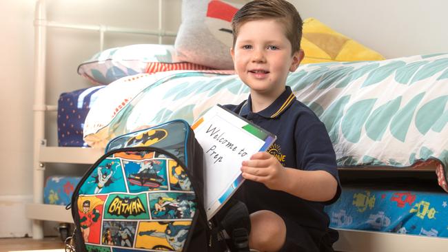 Augustus packs his bag before his first day of Prep. Picture: Jay Town