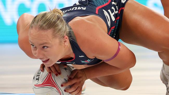 MELBOURNE, AUSTRALIA - JUNE 10: Hannah Mundy of the Vixens attempts to keep the ball in play during the round nine Super Netball match between Melbourne Vixens and Melbourne Mavericks at John Cain Arena, on June 10, 2024, in Melbourne, Australia. (Photo by Kelly Defina/Getty Images)