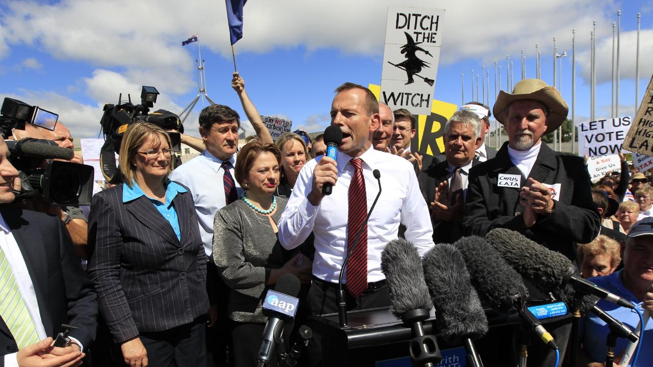 Then-opposition leader Tony Abbott addressing No Carbon Tax protesters on the lawns of Parliament House in Canberra during the 2013 election campaign.