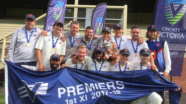 Dandenong shows off the Premier Cricketr pennant.