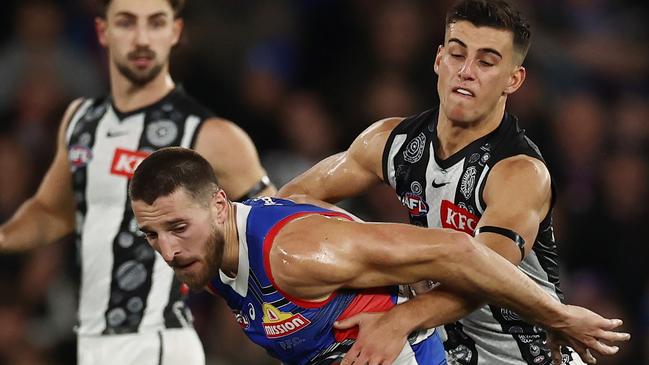 MELBOURNE - July 7 : AFL.   Bulldog Marcus Bontempelli battles with Nick Daicos of the Magpies during the round 17 AFL match between Western Bulldogs and Collingwood at Marvel Stadium  on July 7, 2023.  Photo by Michael Klein.