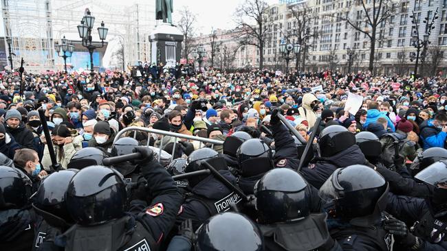 Protesters clash with riot police in downtown Moscow on Sunday. Picture: AFP