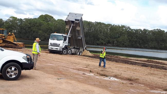 The trucks have returned to Black Swan Lake as the fill-in begins at the so-called Gold Coast borrow pit.