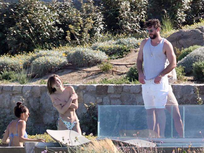 Liam Hemsworth’s girlfriend Gabriella Brooks soaks up the sun in her bikini. Picture: Backgrid