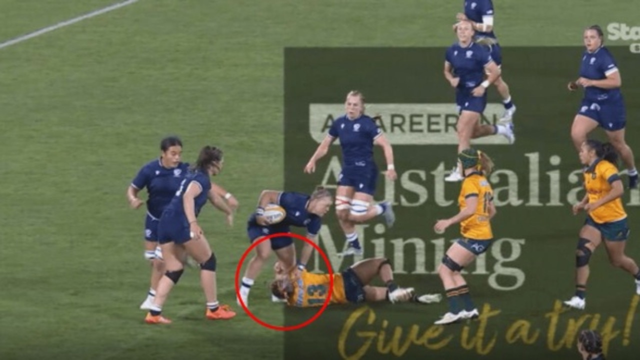 USA's Alev Kelter stomps on Australia's Georgie Friedrichs.