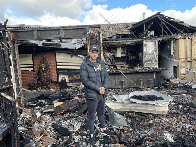 Roy Levanic at the back of the house which was set on fire by former boxer Jamie Bogovic. Picture: Athos Sirianos