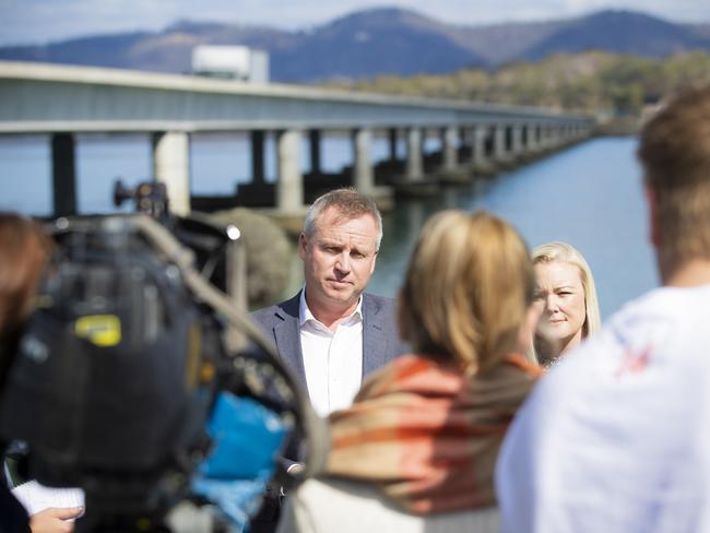 Infrastructure Minister Jeremy Rockliff and Liberal candidate Jessica Whelan at the roads funding announcement nerxt to the causeway at Sorell. Picture: RICHARD JUPE