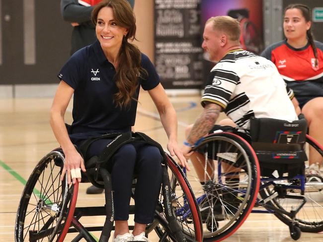 Princess Catherine joins in a game of wheelchair rugby. Picture: AFP