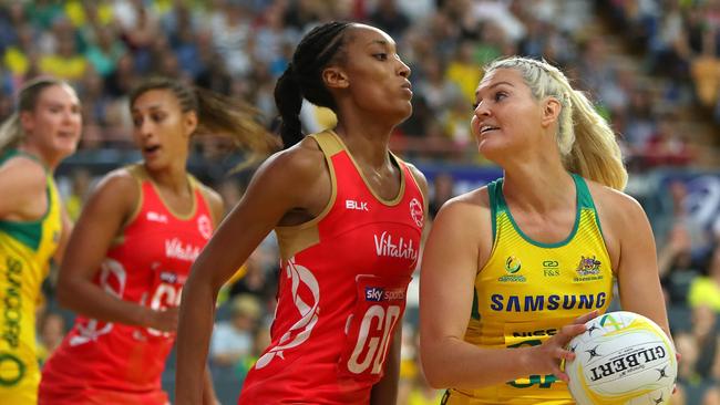 Australia’s goal attack Gretel Tippett holds off the England defence. Picture: Getty Images