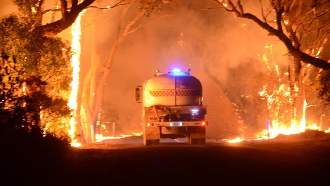 Crews on the Mt Bold Rd, Bradbury. Picture: CFS Promotions Unit