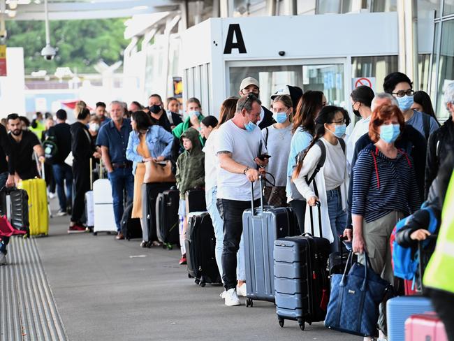 The lines for security are snaking outside the domestic terminals. Picture: NCA NewsWire / Jeremy Piper