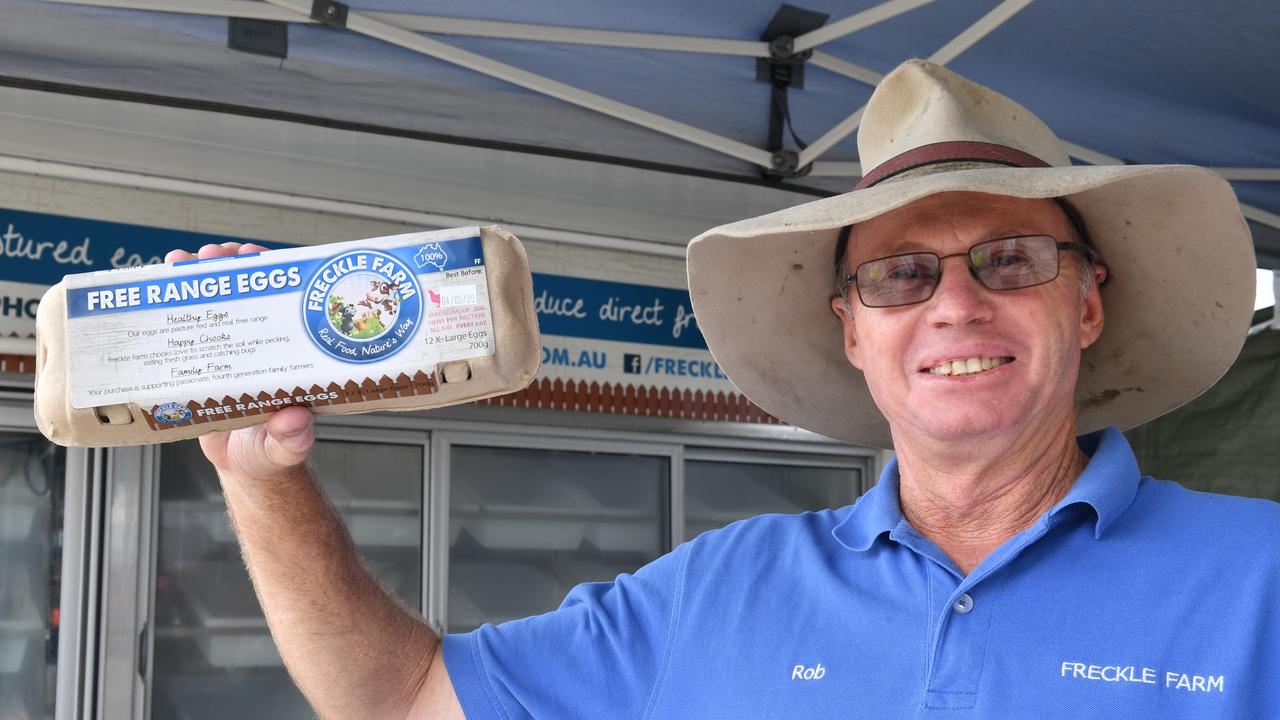 Rob Bauman from Freckle Farm holds up a carton free range eggs at his stall at the Greater Whitsunday Farmers Market. Picture: Tony Martin