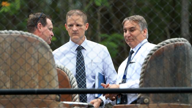 Police examine the scene of the Dreamworld ride tragedy. Photo: Adam Head