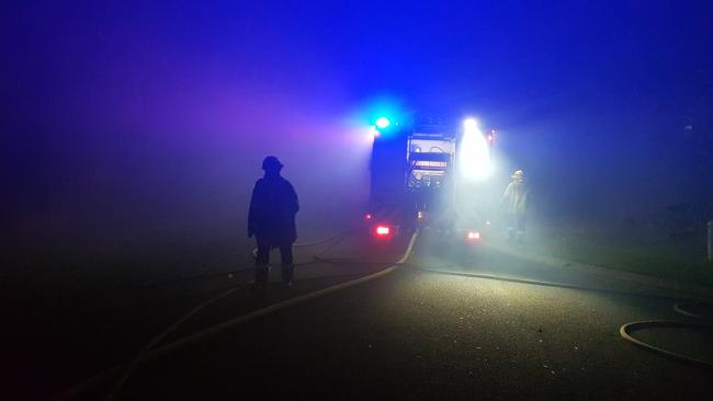 Firefighters battle smoke and darkness near Menai.